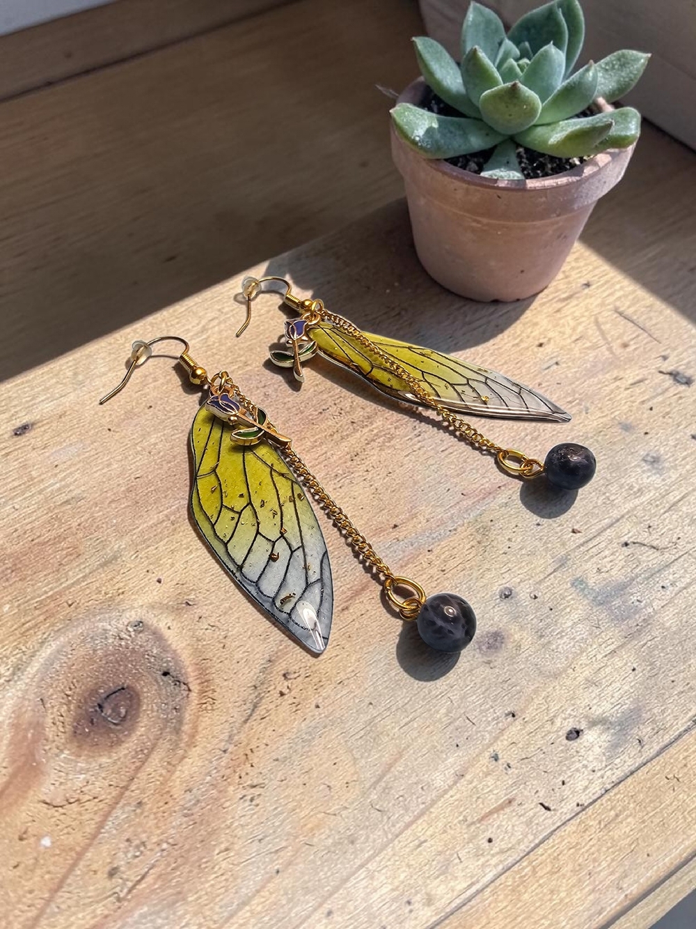 Handcrafted Yellow Wing Drop Earrings with Black Bead Accent